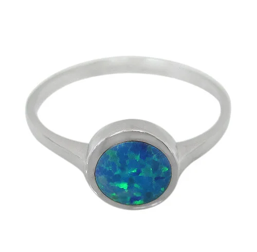 Sterling silver with rhodium, 6.5mm emulated opal stone ring.