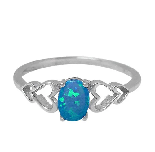 Sterling silver with rhodium, 7x5mm emulated opal stone ring with heart  design.