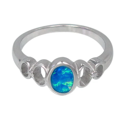 Sterling silver with rhodium, 8x6mm emulated opal stone ring.