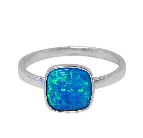 Sterling silver with rhodium, 9x9mm emulated opal stone ring.