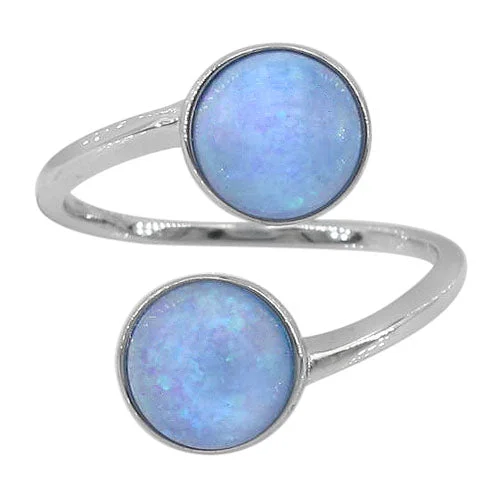 Sterling silver with rhodium, adjustable ring with 8mm emulated opal stone.